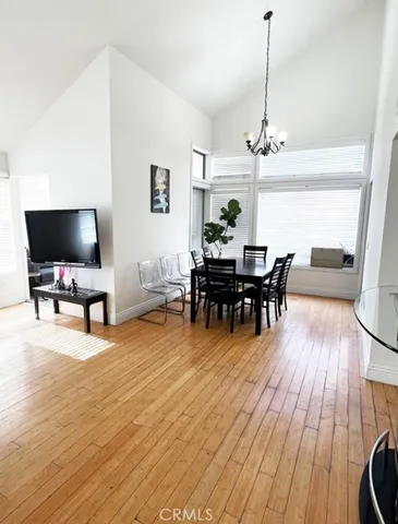 a view of a livingroom with furniture and wooden floor