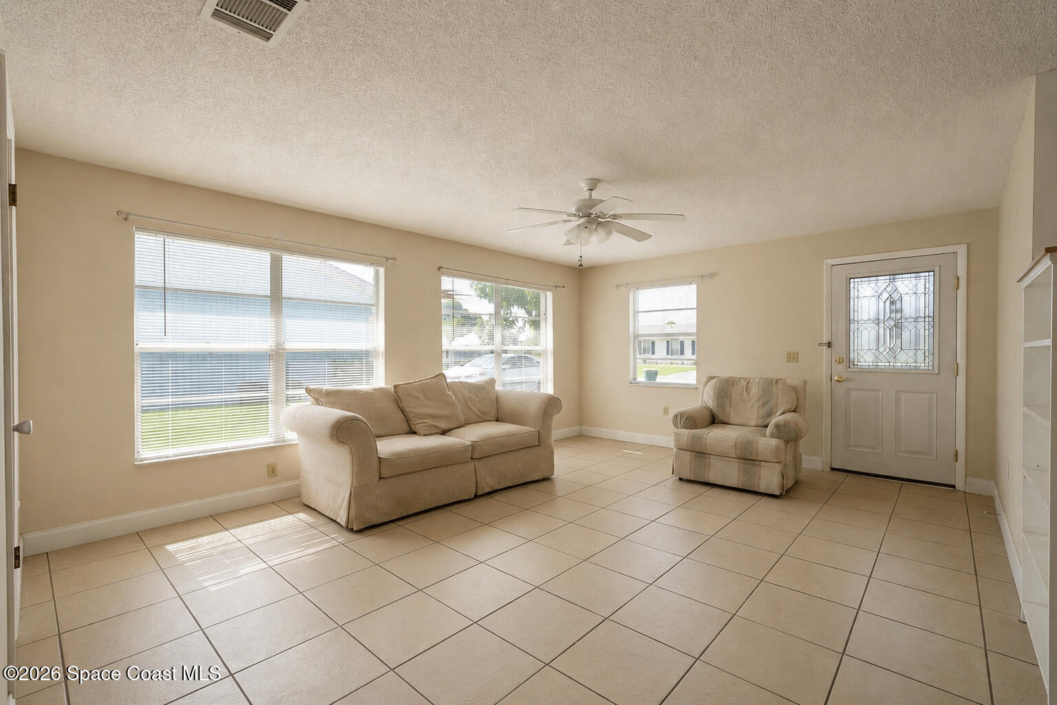 2882 Pembroke Road Melbourne, FL 32935 - Photo 3 of 26 4-Family Room