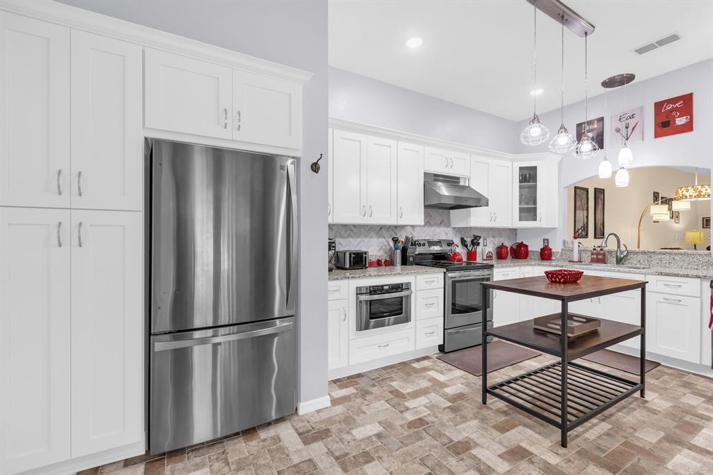 7945 Southwest 115th Loop Ocala, FL 34476 - Photo 11 of 32 Gallery Image 11