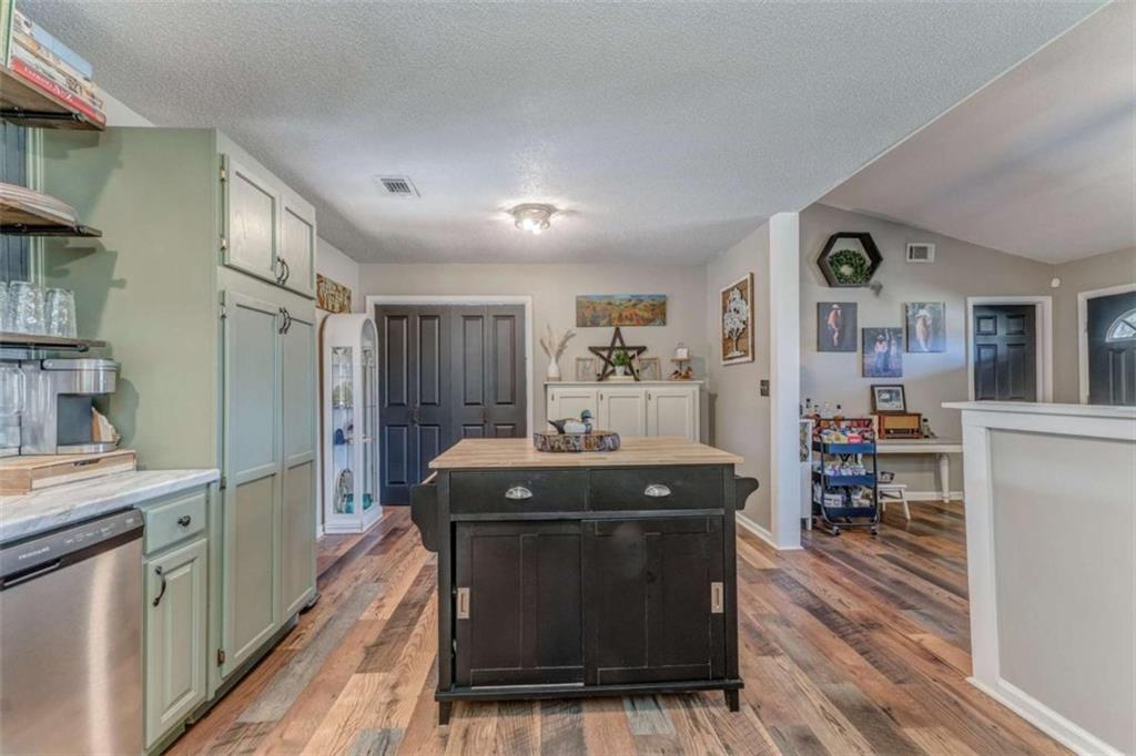 943 Shiloh Road Cedartown, GA 30125 - Photo 20 of 51 a kitchen with stainless steel appliances granite countertop a stove and a refrigerator
