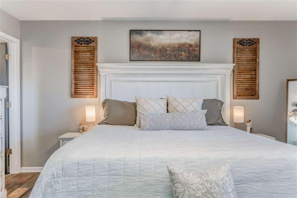 943 Shiloh Road Cedartown, GA 30125 - Photo 26 of 51 a bedroom with a large bed and a window