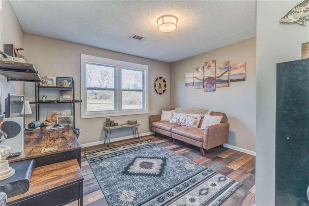 943 Shiloh Road Cedartown, GA 30125 - Photo 27 of 51 a living room with furniture and a window