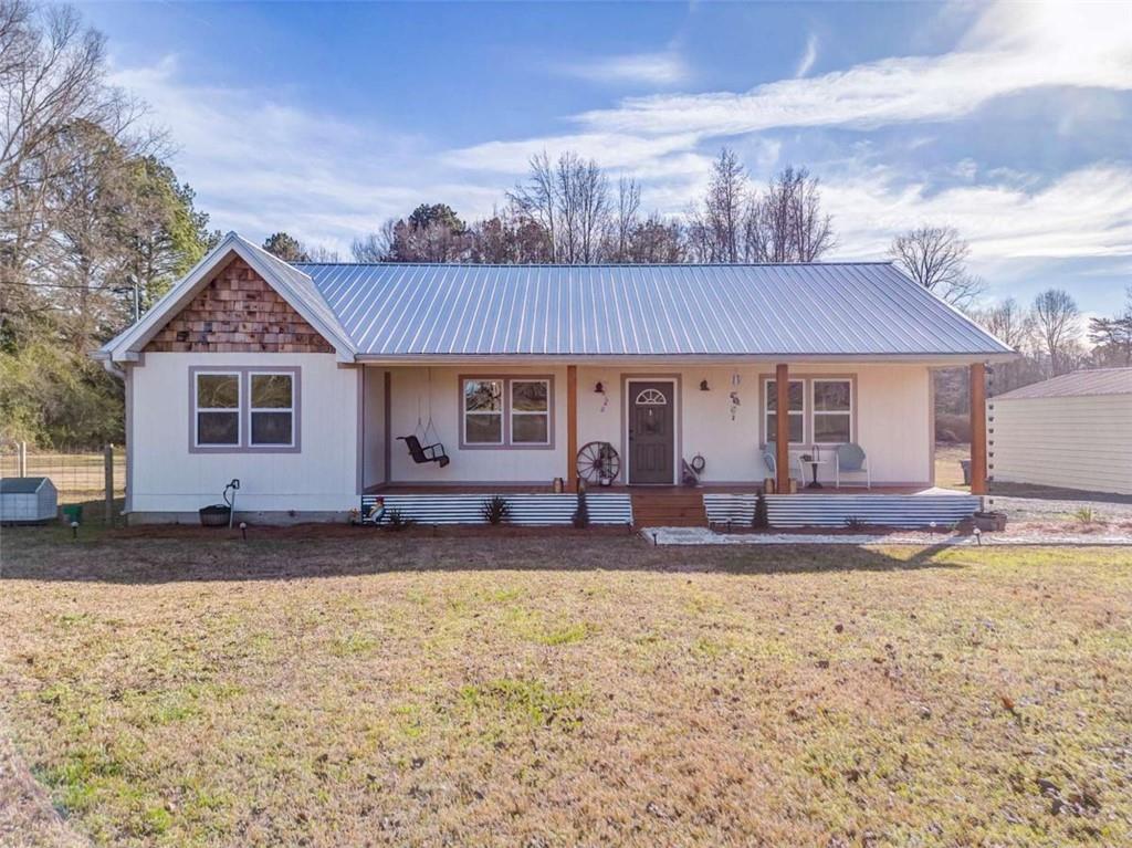 943 Shiloh Road Cedartown, GA 30125 - Photo 3 of 51 a front view of a house with a yard