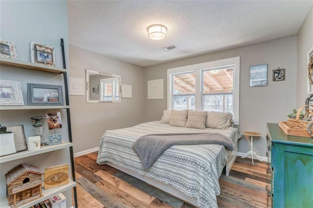 943 Shiloh Road Cedartown, GA 30125 - Photo 33 of 51 a bedroom with a bed and a window