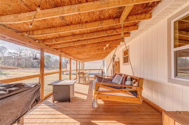 a view of a patio with swimming pool