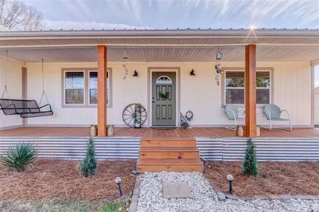 a view of parking garage with cars