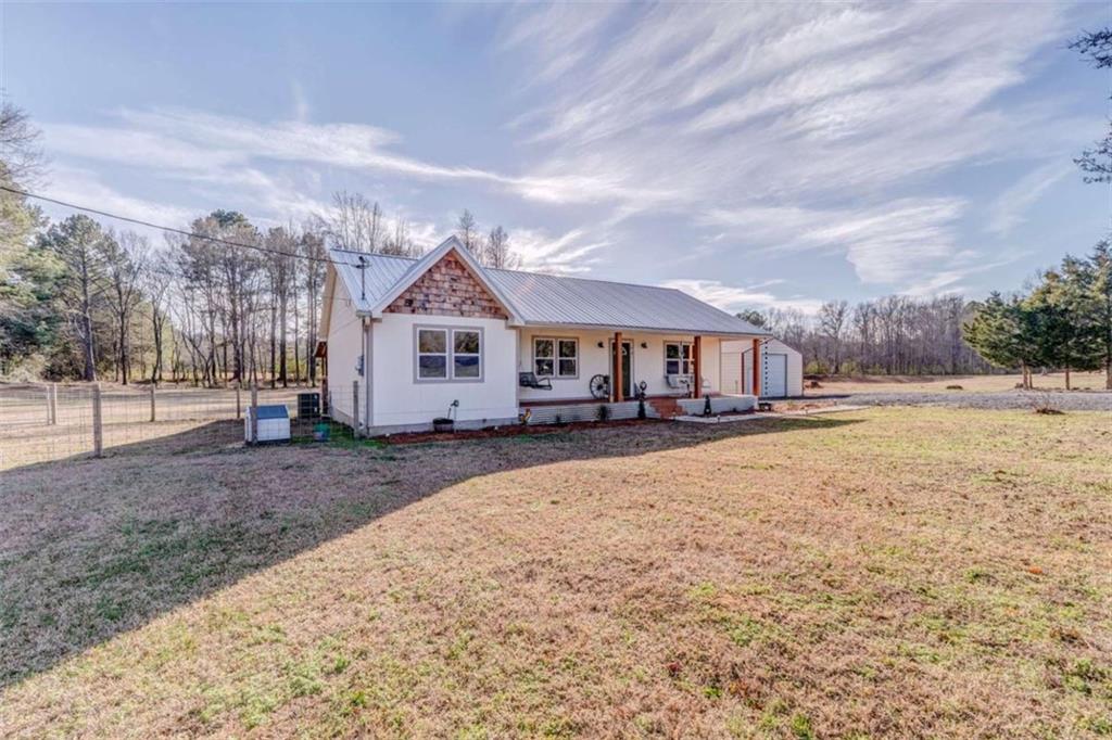 943 Shiloh Road Cedartown, GA 30125 - Photo 45 of 51 a view of house with yard and sitting area