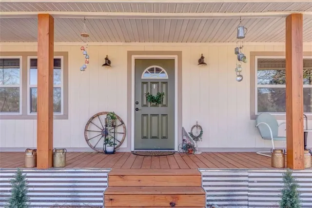 a front view of a house with wooden floor