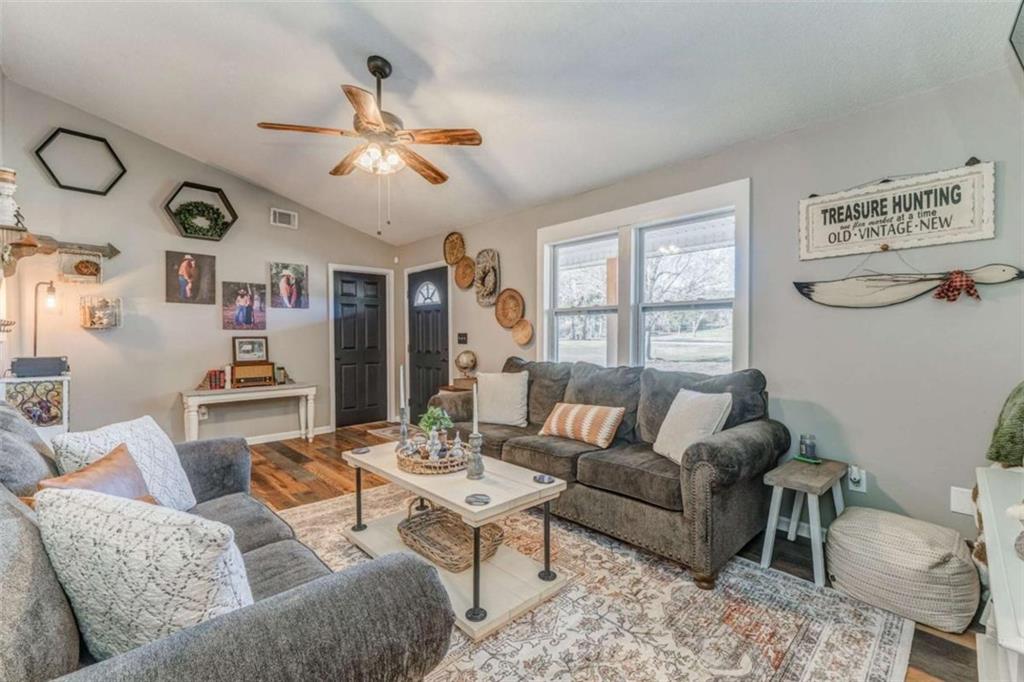 943 Shiloh Road Cedartown, GA 30125 - Photo 8 of 51 a living room with furniture and a large window
