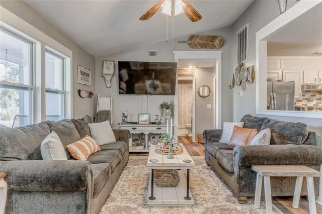 a living room with furniture and a couch