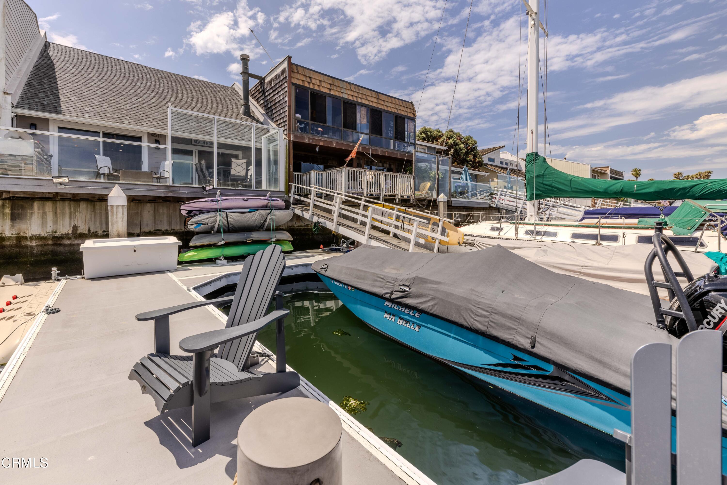 4511 Gateshead Bay Oxnard, CA 93035 - Photo 12 of 36 a view of a patio with chairs and a table