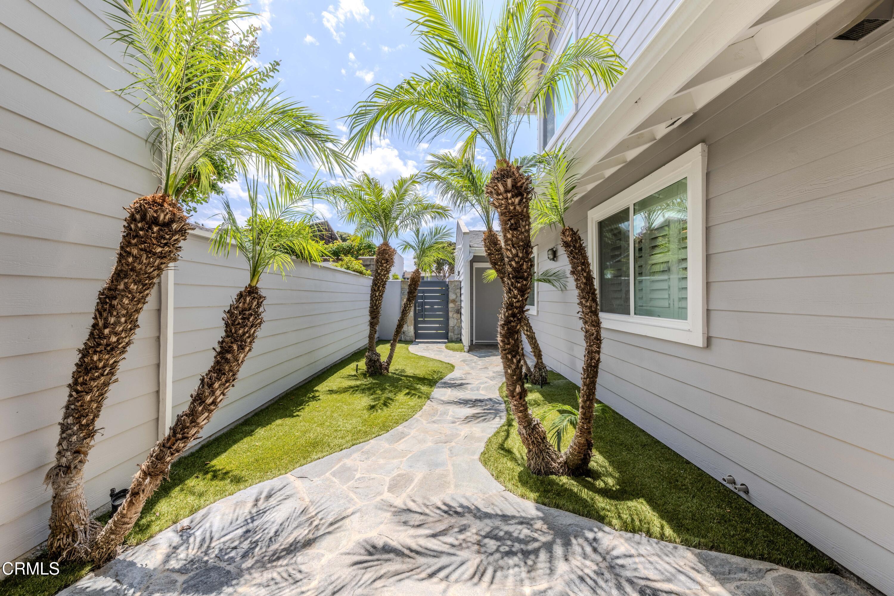 4511 Gateshead Bay Oxnard, CA 93035 - Photo 32 of 36 a front view of a house with garden