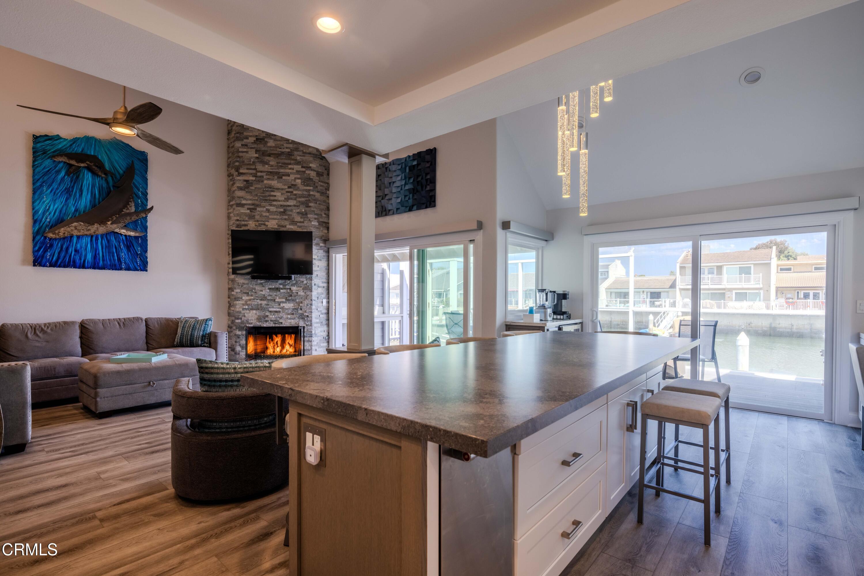 4511 Gateshead Bay Oxnard, CA 93035 - Photo 6 of 36 a living room with furniture and a flat screen tv