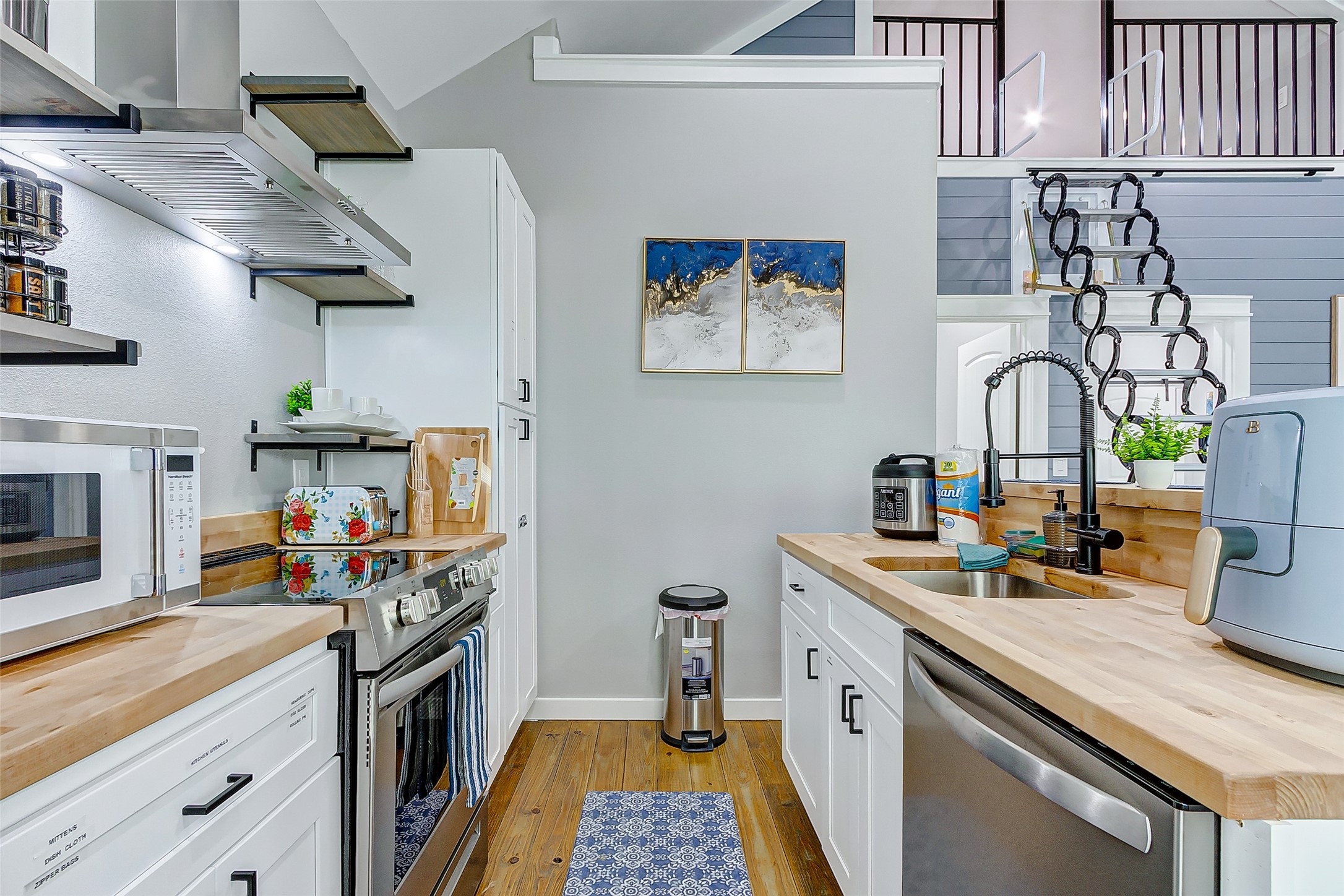 1079 Johnson Road Port Bolivar, TX 77650 - Photo 11 of 35 a kitchen with stainless steel appliances granite countertop a stove and a sink