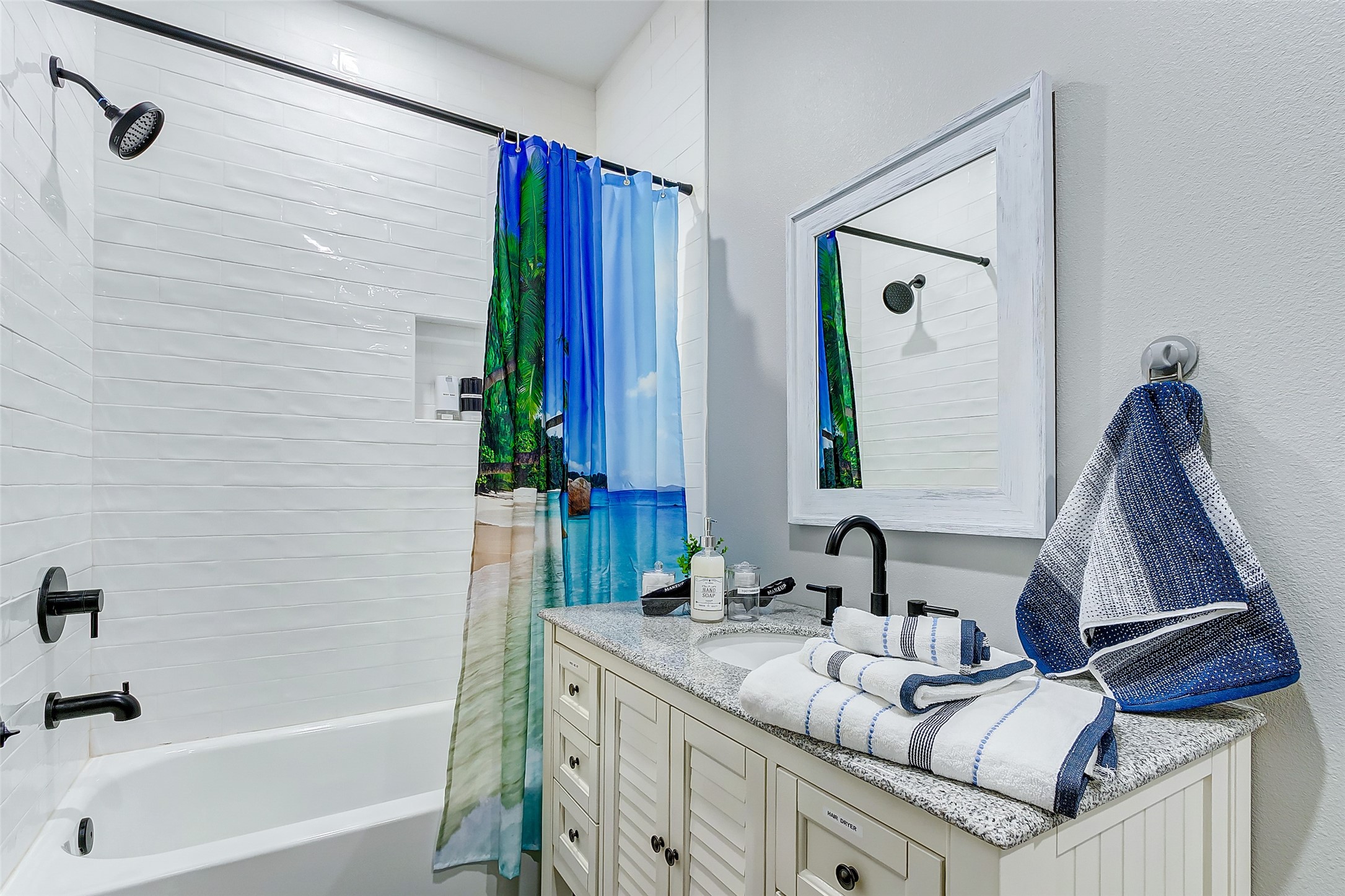 1079 Johnson Road Port Bolivar, TX 77650 - Photo 20 of 35 a bathroom with a sink and a mirror
