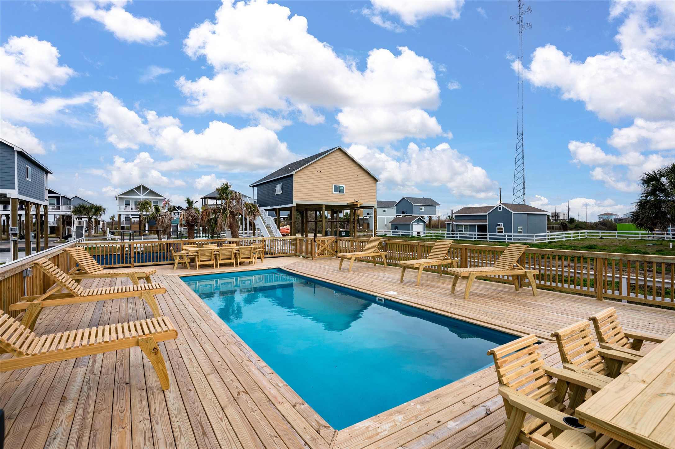 1079 Johnson Road Port Bolivar, TX 77650 - Photo 28 of 35 a view of a patio with swimming pool table and chairs