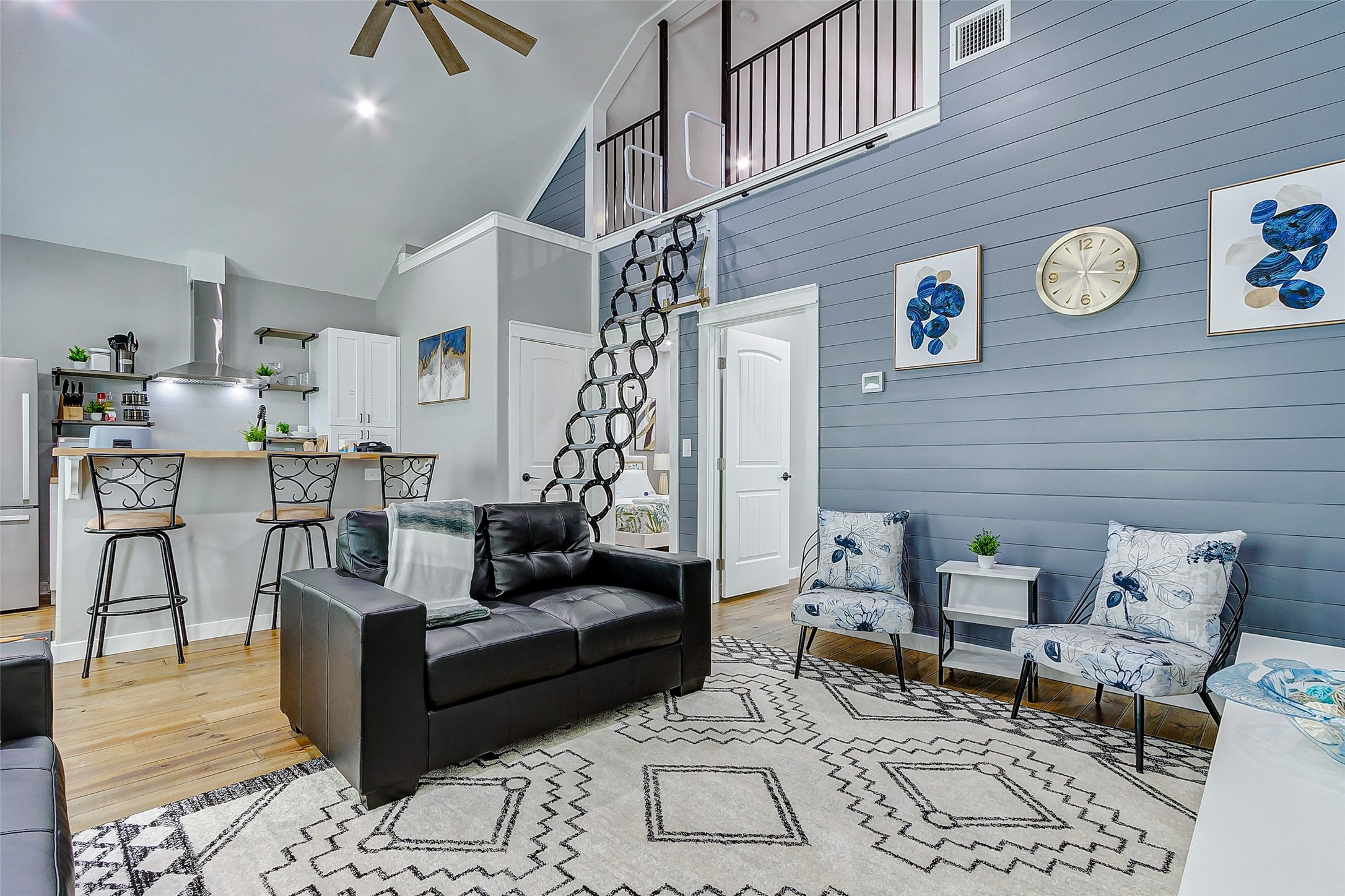 1079 Johnson Road Port Bolivar, TX 77650 - Photo 9 of 35 a living room with furniture and wooden floor