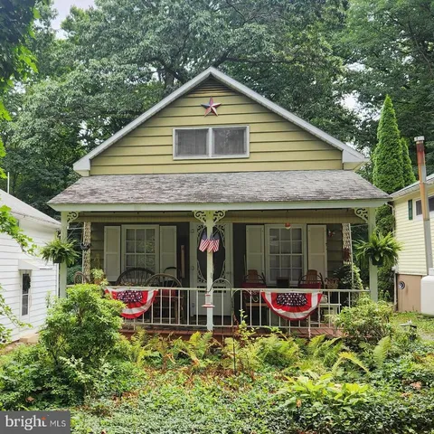 a backyard of a house with seating space