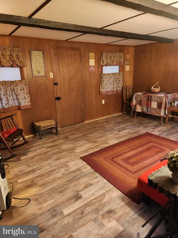 a view of a livingroom with furniture