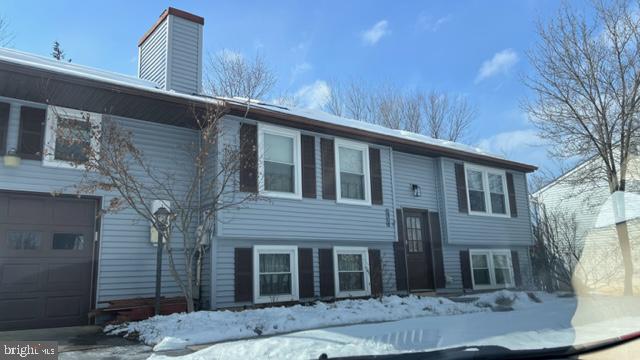 1314 Hillcrest Drive Frederick, MD 21703 - Photo 3 of 11 a front view of a house with a yard