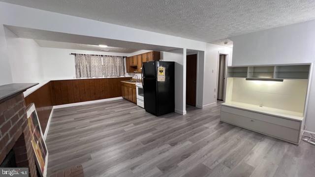 1314 Hillcrest Drive Frederick, MD 21703 - Photo 4 of 11 a view of a room with wooden floor and furniture
