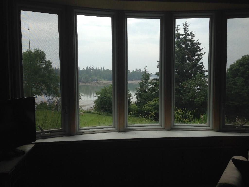 98 Reach Road Brooklin, ME 04616 - Photo 6 of 23 Bay window in living room enhances...