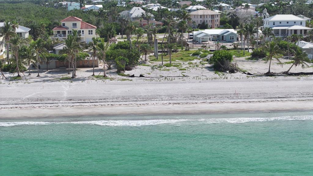 6453 Gulfside Road Longboat Key, FL 34228 - Photo 11 of 21 a view of multiple houses with a yard