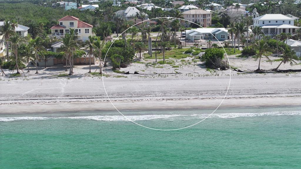 6453 Gulfside Road Longboat Key, FL 34228 - Photo 10 of 21 a view of multiple houses with a yard