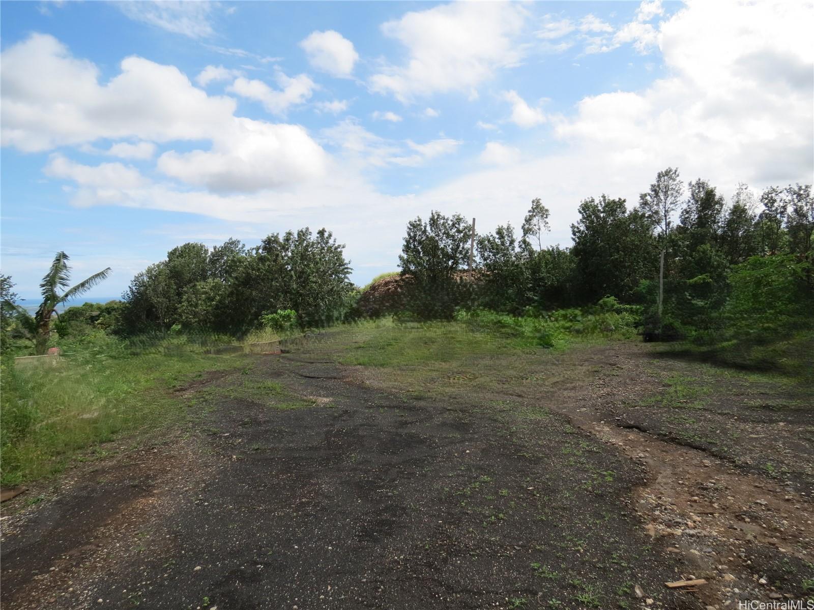 94-1100 Kunia Road, Unit 42F Waipahu, HI 96797 - Photo 12 of 25 a view of a field with trees in background