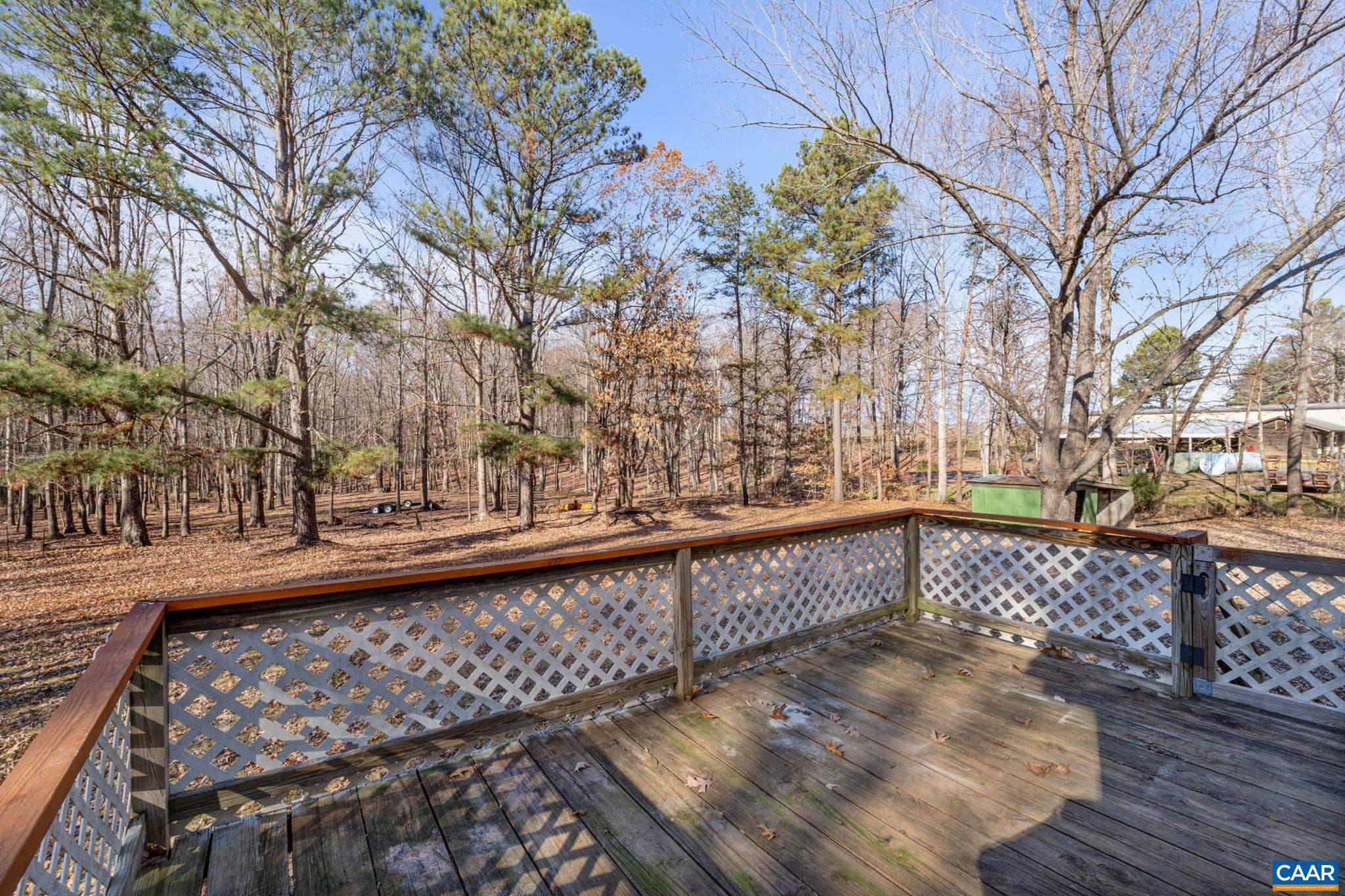 371 Fanny White Road Buckingham, VA 23921 - Photo 23 of 43 a view of a balcony with wooden fence