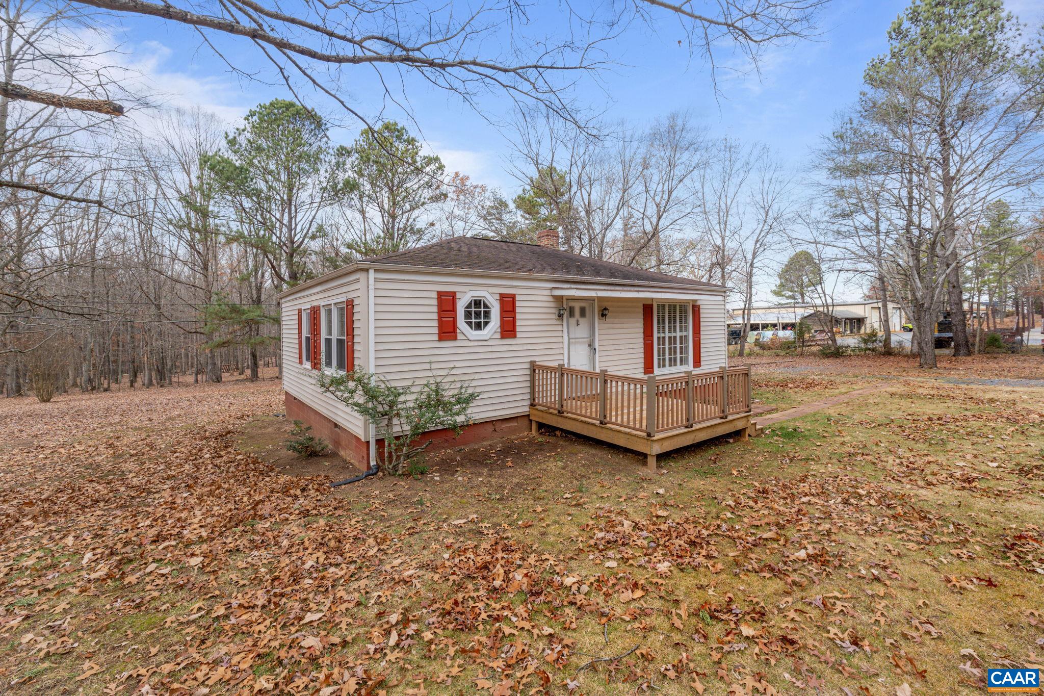 371 Fanny White Road Buckingham, VA 23921 - Photo 42 of 43 a view of a house with a yard and large trees