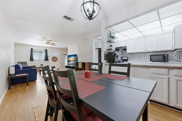 a view of a dining room with furniture
