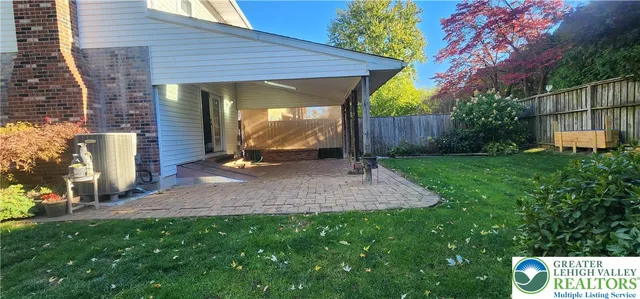 a view of a back yard with green space