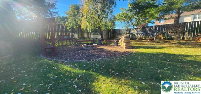 a view of swimming pool with a patio
