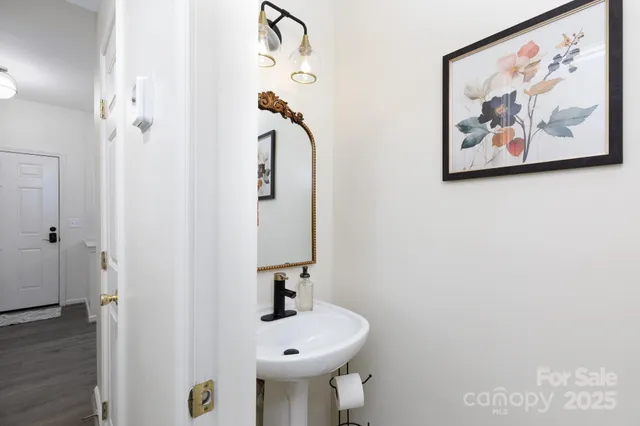 a close up of a utility room with washer and dryer