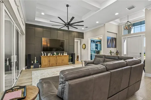 a view of an outdoor dining space with a table and chairs