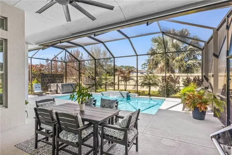 a bathroom with a double vanity sink mirror and shower