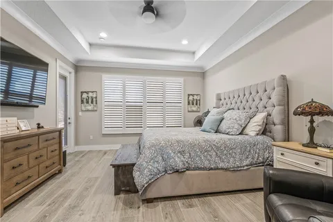 a bathroom with a toilet a sink and a mirror