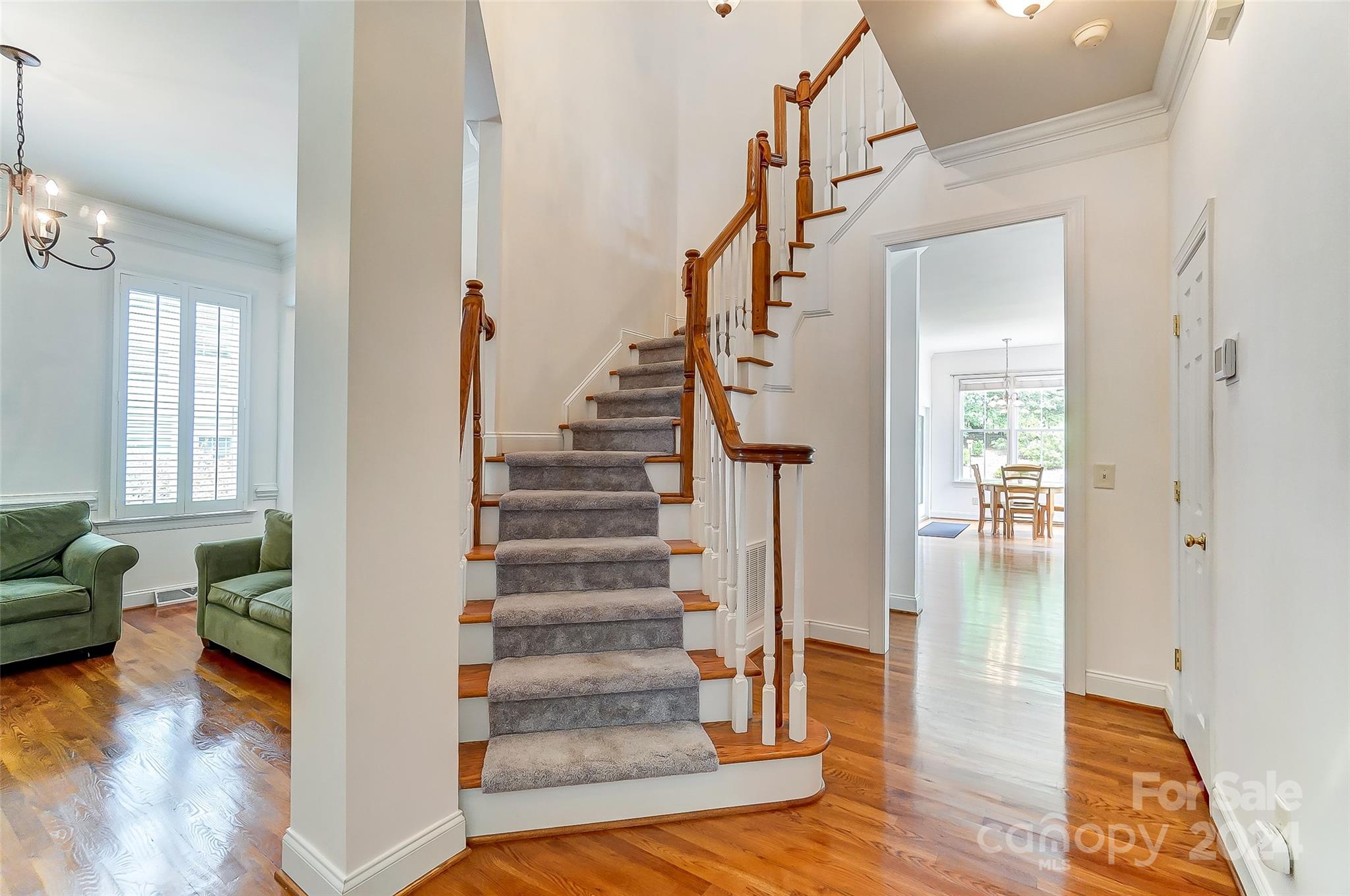 412 Sophia Court Fort Mill, SC 29708 - Photo 14 of 34 a view of entryway and hall with wooden floor