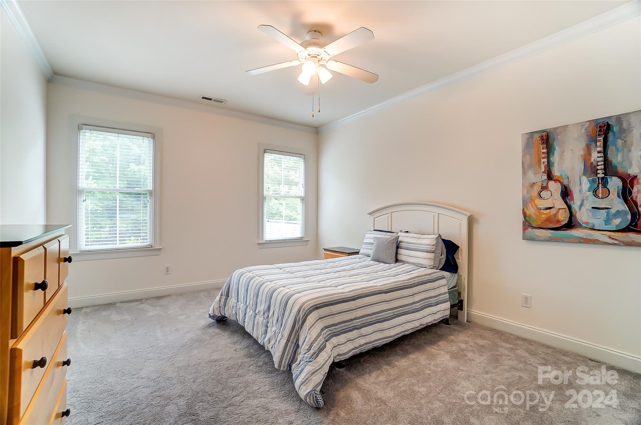 412 Sophia Court Fort Mill, SC 29708 - Photo 19 of 34 a bedroom with a bed and a window