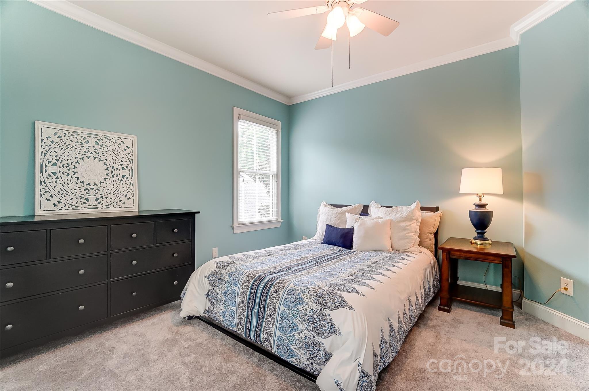 412 Sophia Court Fort Mill, SC 29708 - Photo 22 of 34 a bedroom with a bed and a window