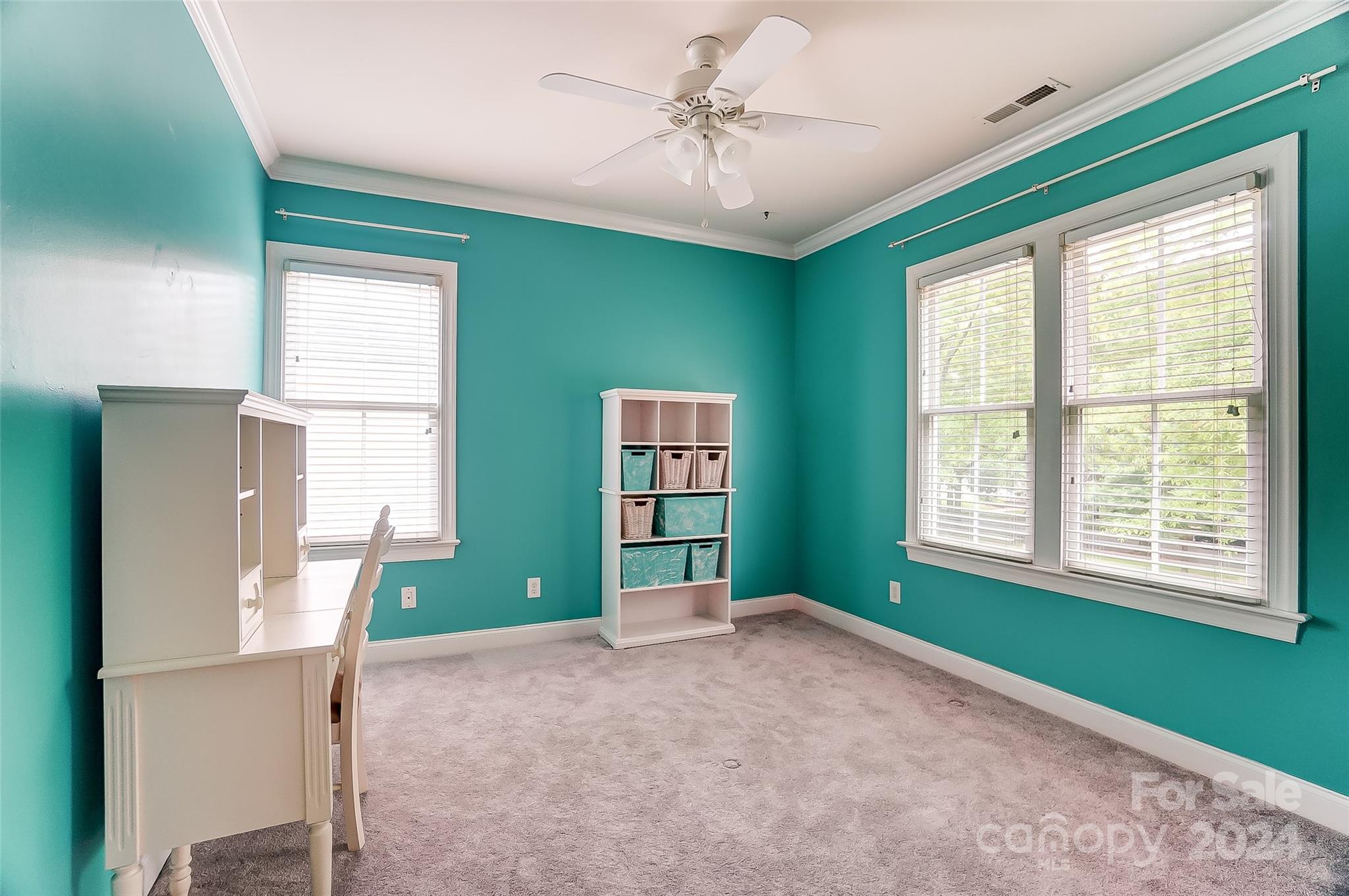 412 Sophia Court Fort Mill, SC 29708 - Photo 23 of 34 a living room with a window and a chandelier