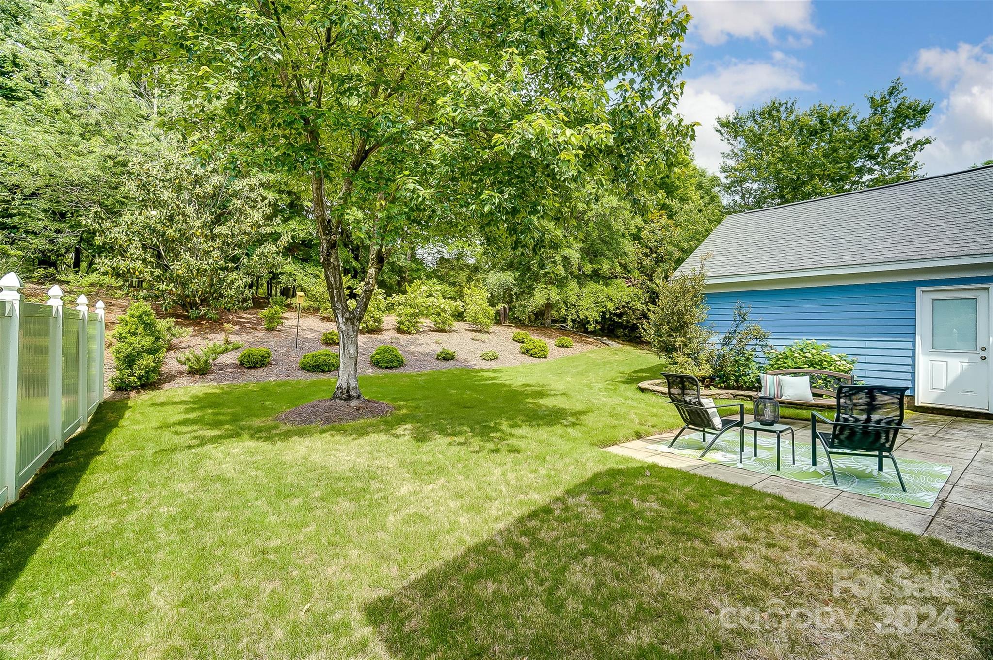 412 Sophia Court Fort Mill, SC 29708 - Photo 31 of 34 a view of a house with backyard and sitting area