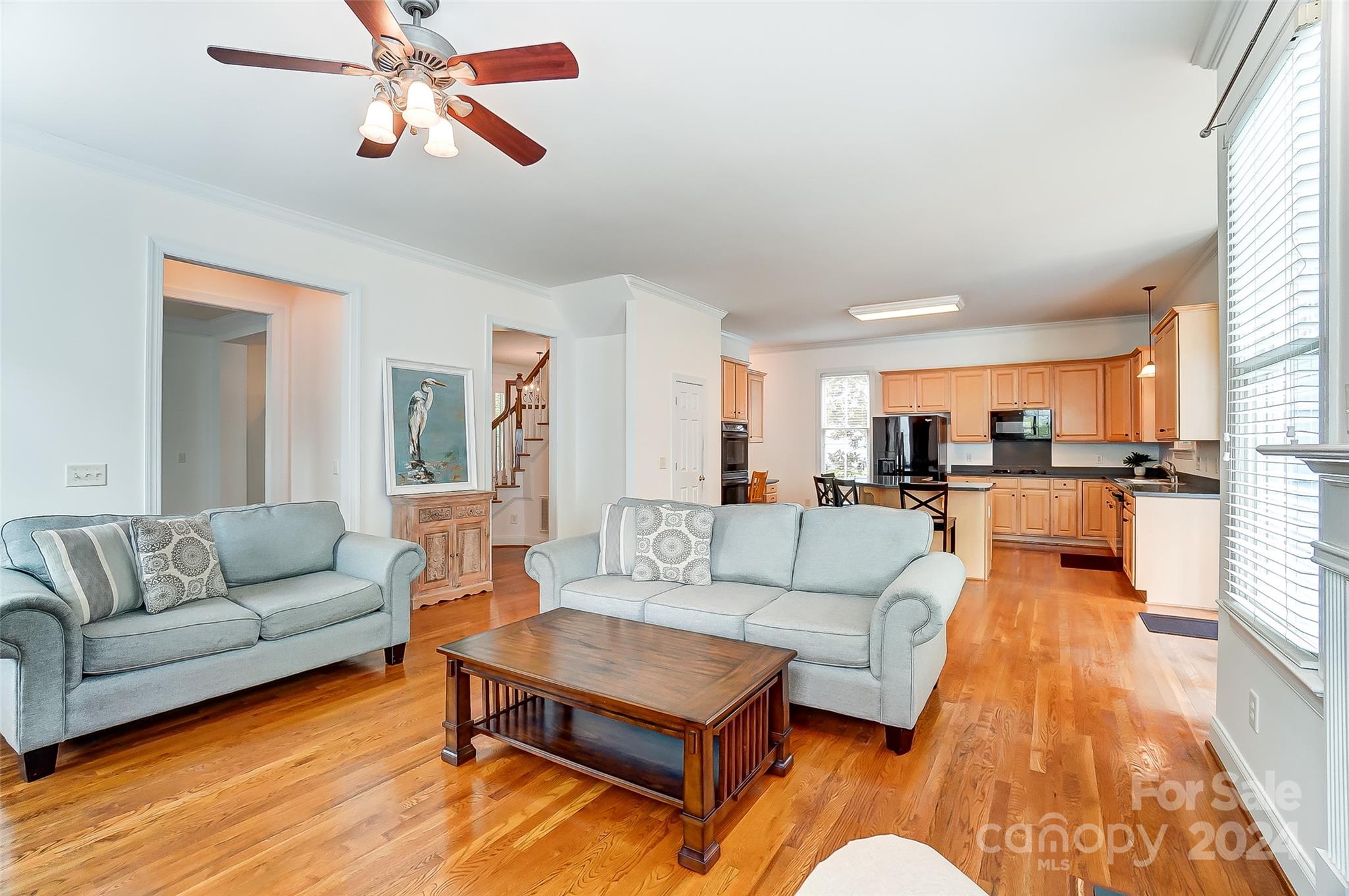 412 Sophia Court Fort Mill, SC 29708 - Photo 6 of 34 a living room with furniture and kitchen view