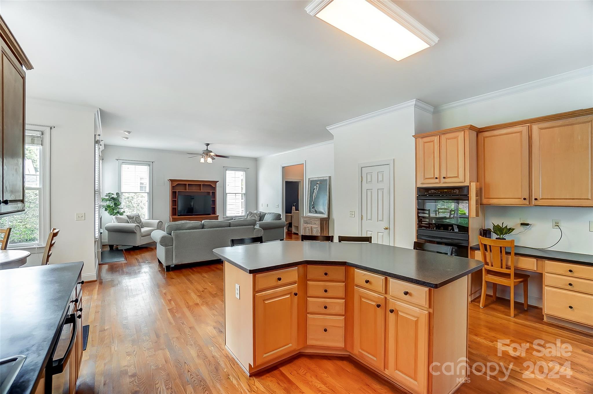 412 Sophia Court Fort Mill, SC 29708 - Photo 10 of 34 a kitchen with stainless steel appliances granite countertop a stove sink and cabinets