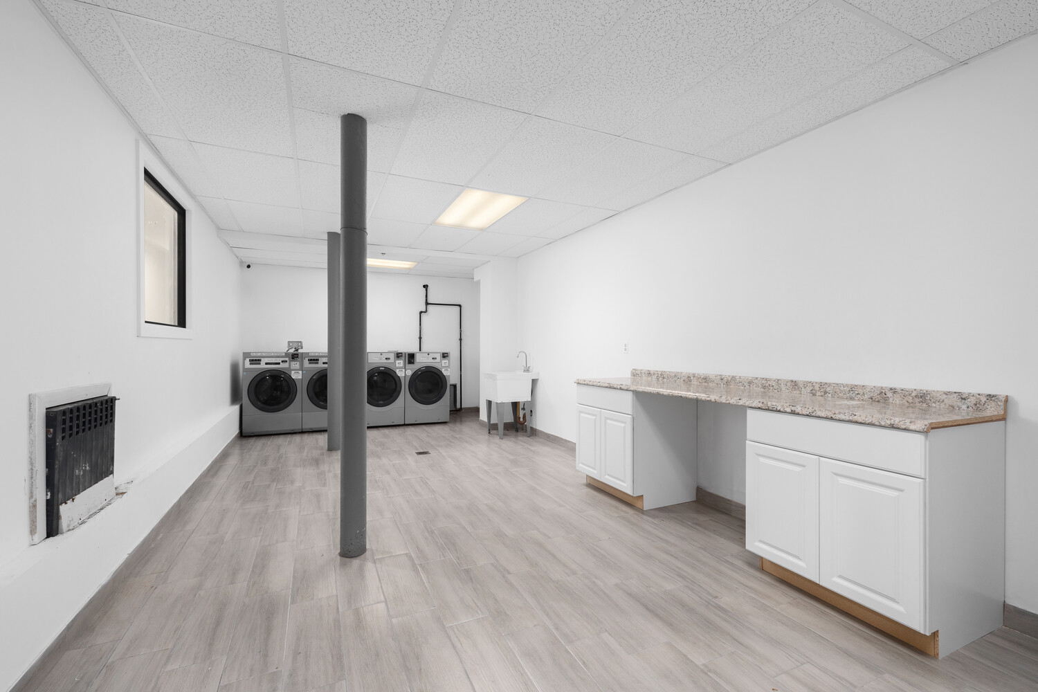 8 West 87th Street, Unit 3R Manhattan, NY 10024 - Photo 4 of 7 a living room with furniture and a wooden floor