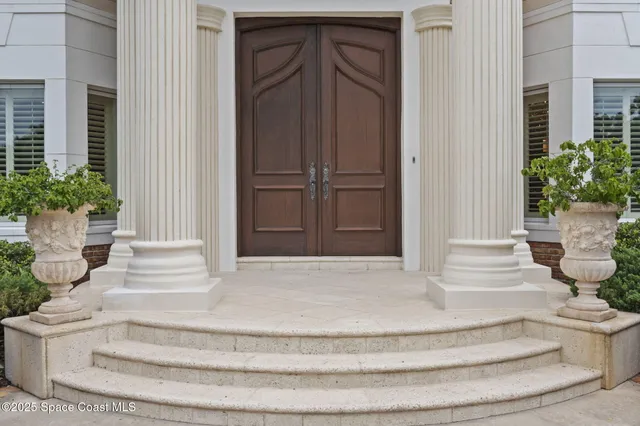 a living room with furniture fireplace and a table