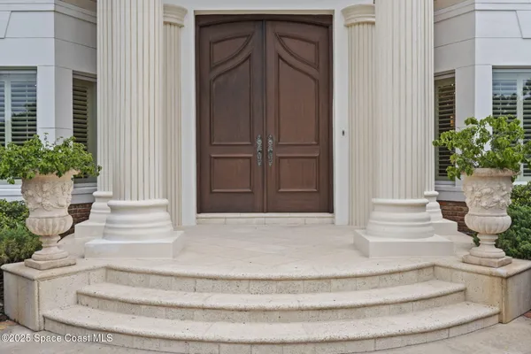 a bathroom with a bathtub and a window