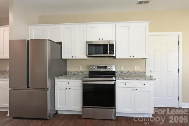 a view of a hallway with elevator