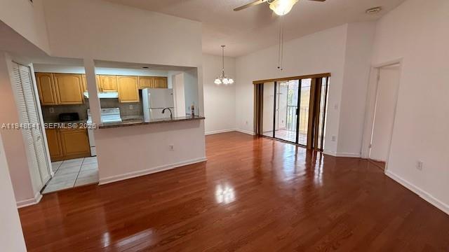 9691 Southwest 138th Avenue, Unit QC2L Miami, FL 33186 - Photo 24 of 48 wooden floor in an empty room with a window